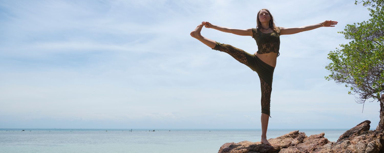 standing one leg yoga pose, balancing on one leg yoga pose, one hand one leg yoga pose, One leg yoga pose benefits, One leg yoga pose for beginners, one leg pose, yoga poses