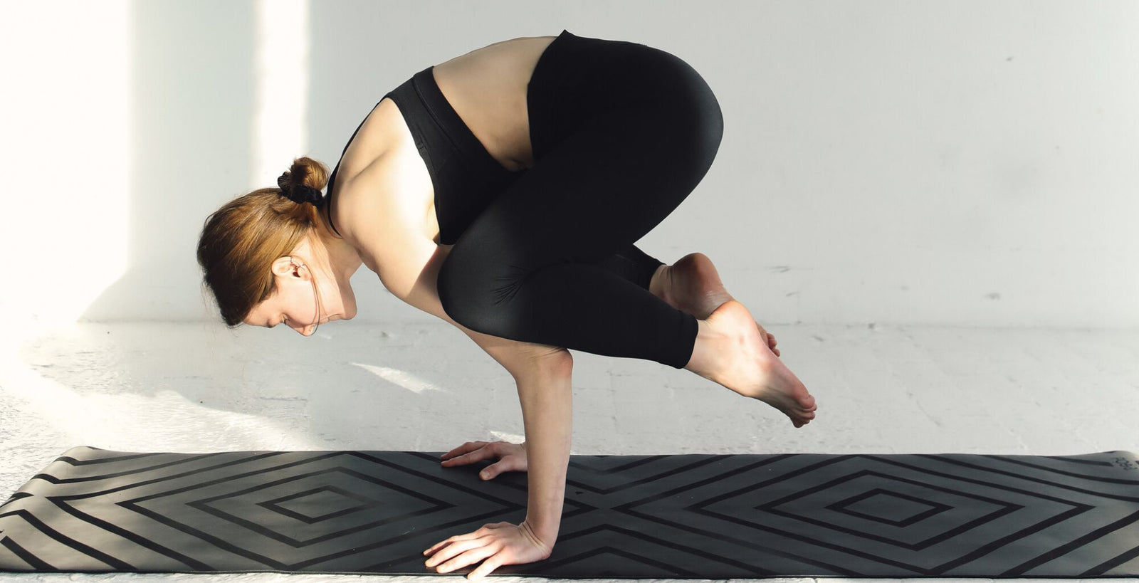 What are the Benefits of Crow Pose in Yoga?
